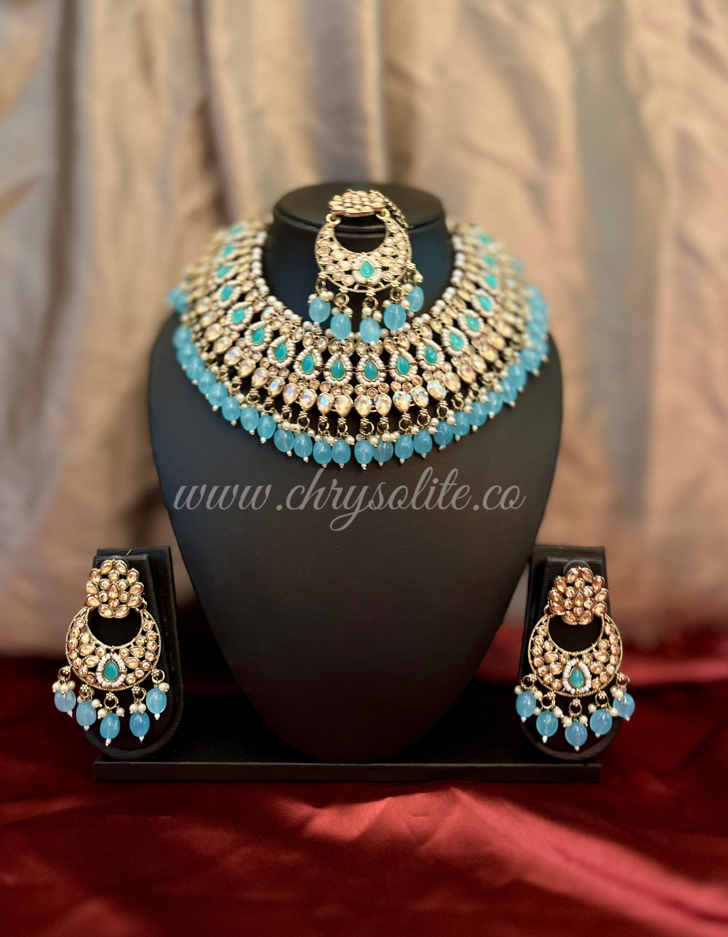 Sky Blue Light Copper Kundan Heavy Necklace Set with Earrings and Mangtika