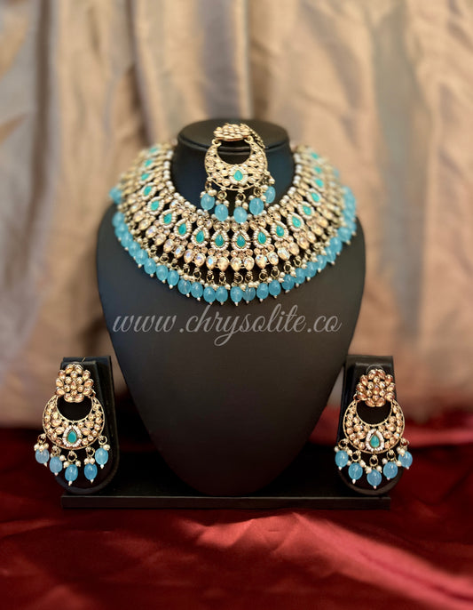 Sky Blue Light Copper Kundan Heavy Necklace Set with Earrings and Mangtika
